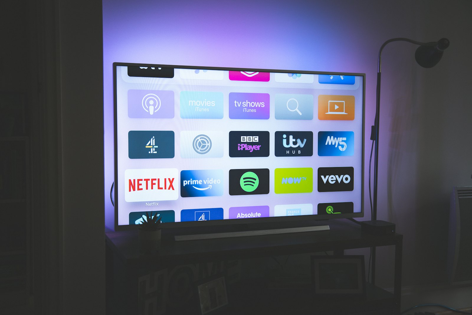A flat-screen television in a living room. Unsplash.